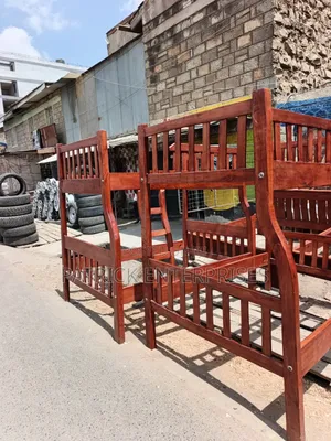 This Handcrafted Solid Wood Double-Decker Bed Redish Brown Varnish