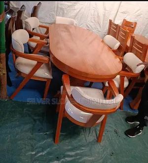 6- Seater Oval Shaped Dinning Sets.
