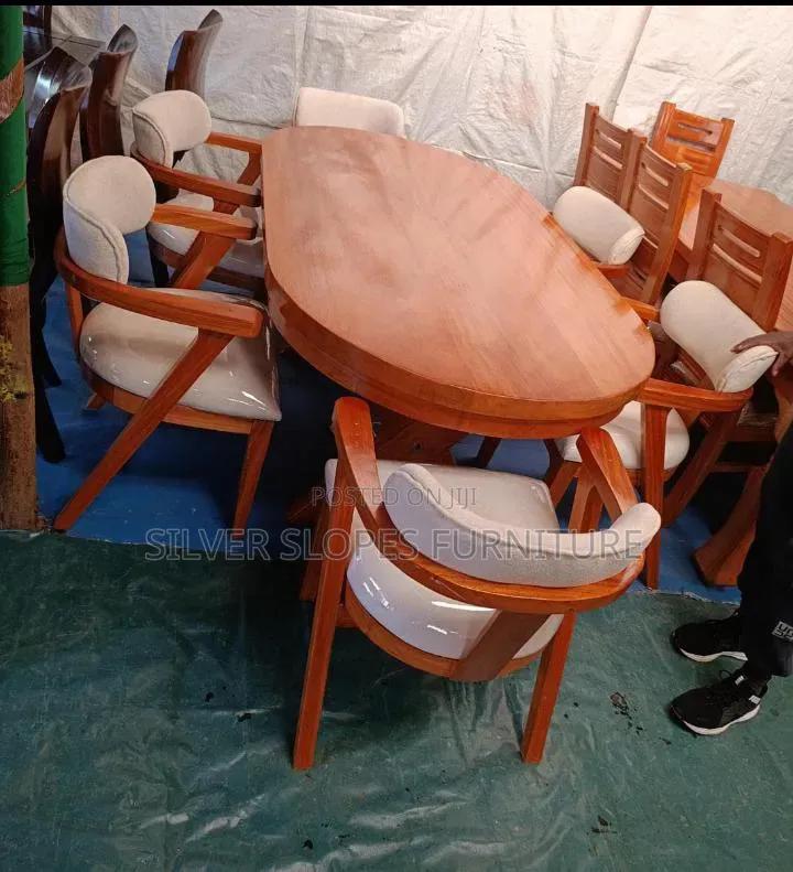 6- Seater Oval Shaped Dinning Sets.