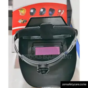 Auto-darkening welding shield
