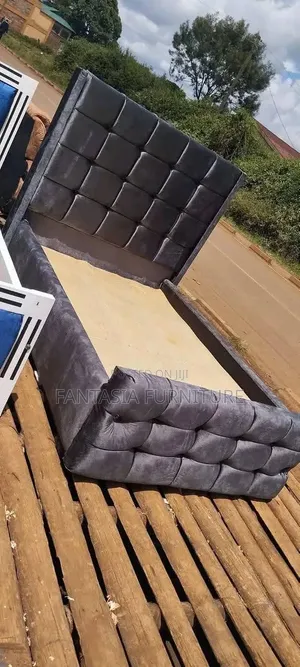 Charcoal Tufted 5 by 6 Bed.