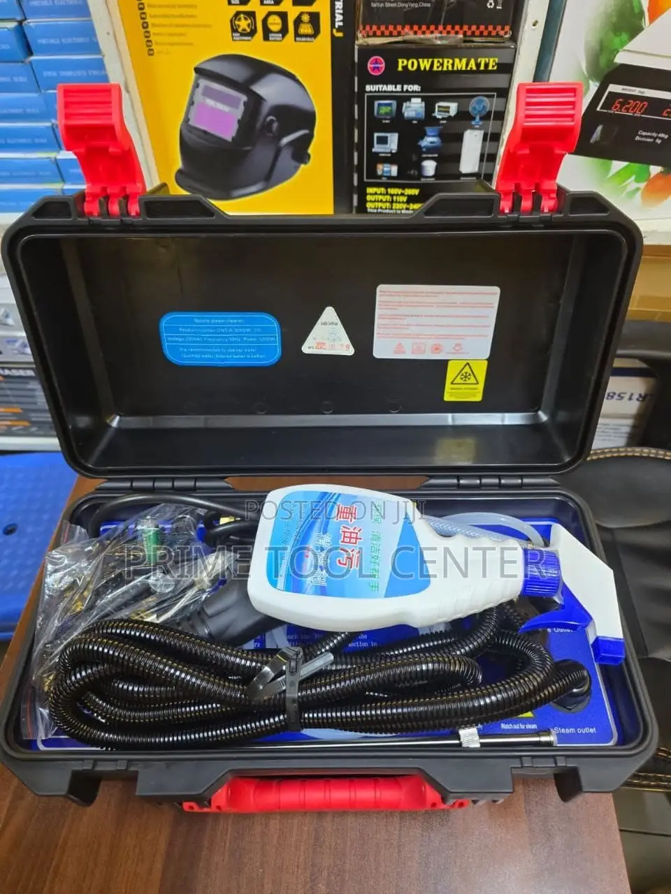 Portable high-pressure steam cleaner in a toolbox