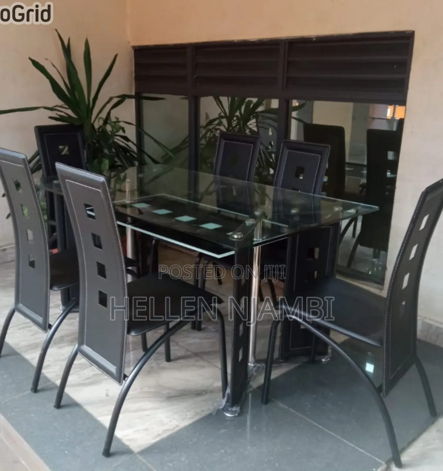 Executive 6 Sitter Glass Dinning Table With Leather Seat
