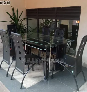 Executive 6 Sitter Glass Dinning Table With Leather Seat