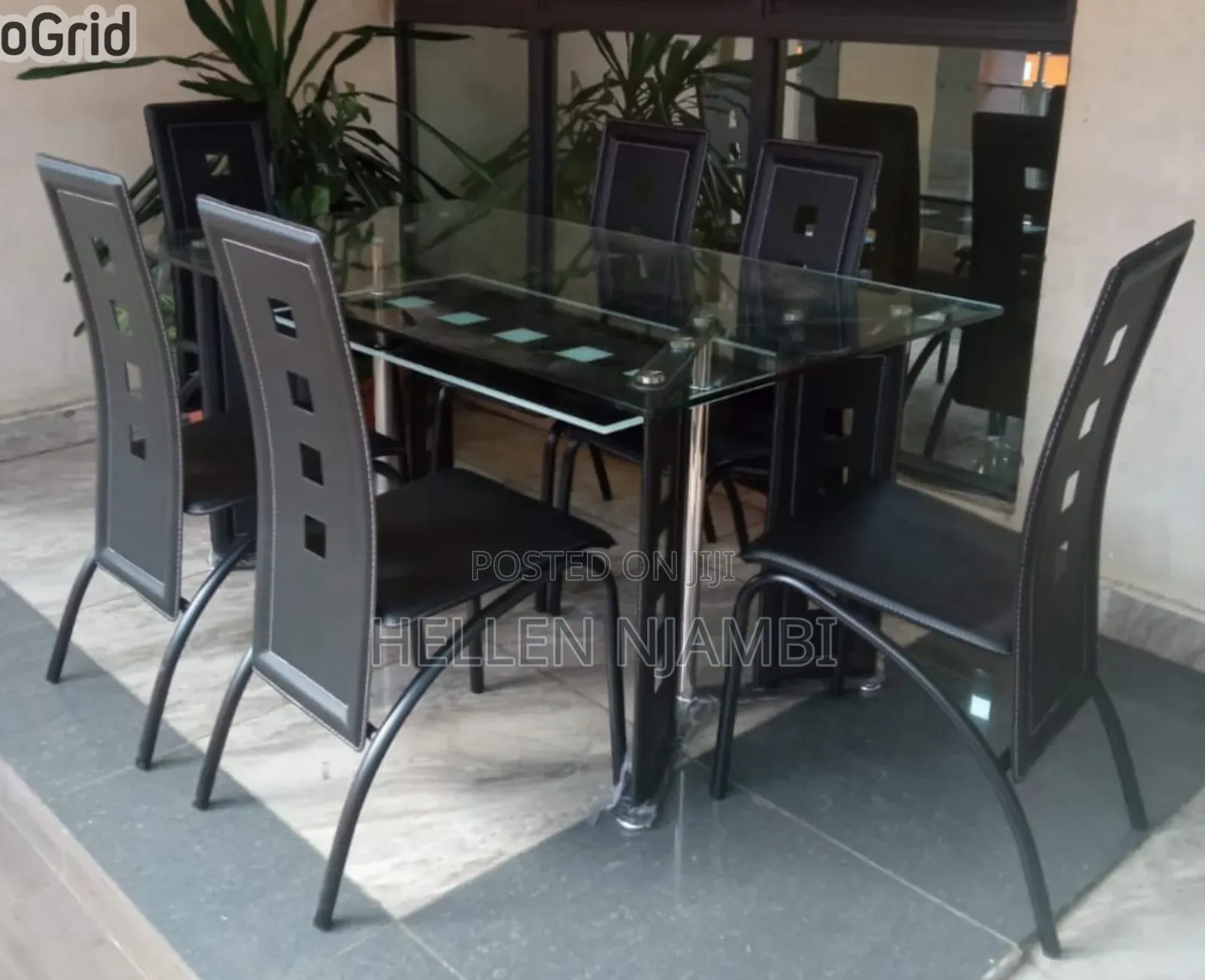 Executive 6 Sitter Glass Dinning Table With Leather Seat