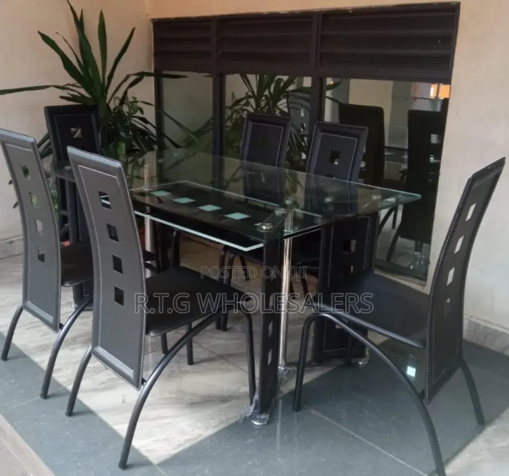 Executive 6 Sitter Glass Dinning Table With Leather Seat at 