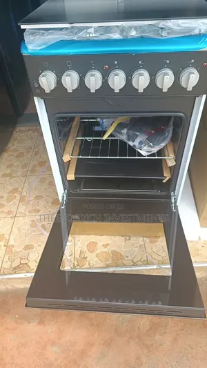 New Black Haier 3+1 Standing Cooker With Electric Oven Size 55*60