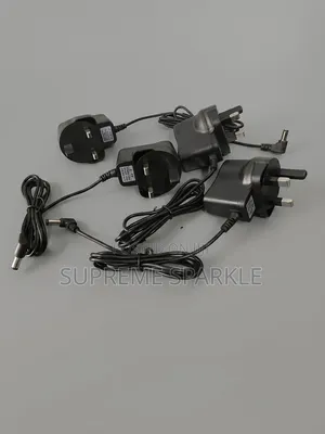 AC DC 3-Pin Power Adapter Battery Charger. Output DC 6.0V / 1000mA