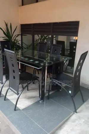 Executive 6 Sitter Glass Dinning Table With Leather Seat