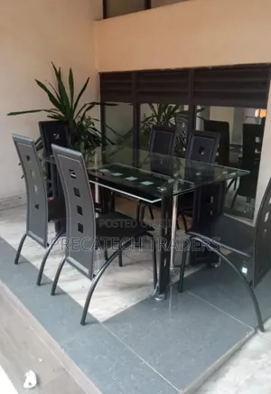 Executive 6 Sitter Glass Dinning Table With Leather Seat