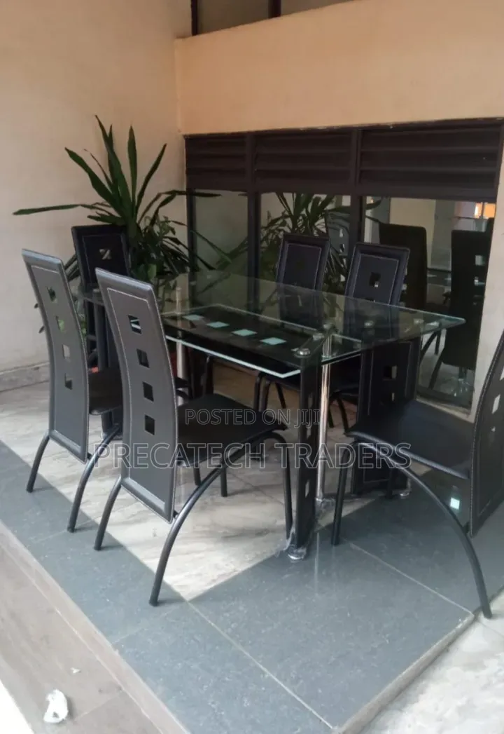 Executive 6 Sitter Glass Dinning Table With Leather Seat