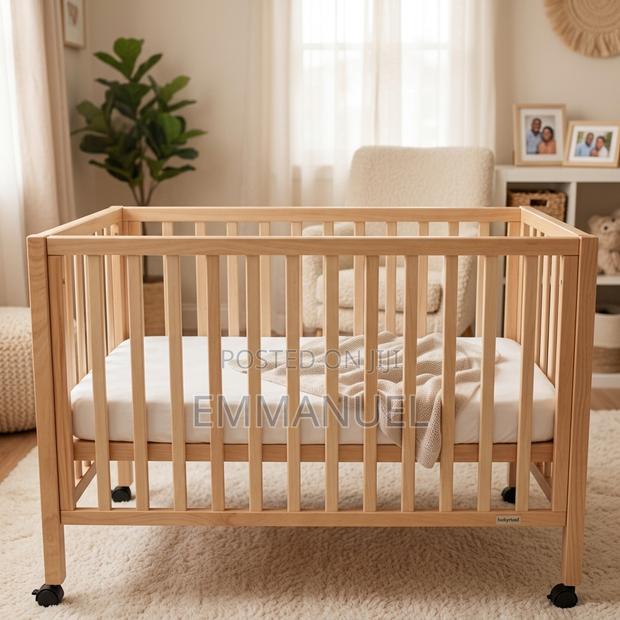 Wooden Baby Cot With Wheels