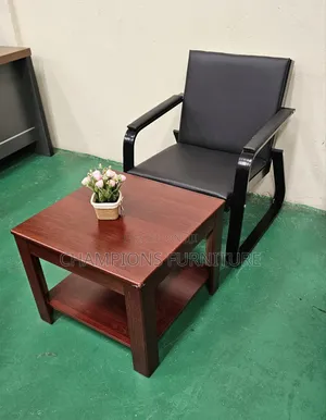 Black Leather Receptuon Chair and Coffee Table