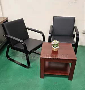 Black Leather Receptuon Chair and Coffee Table