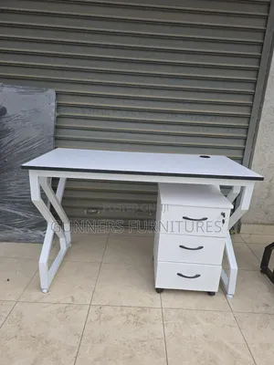 White Metallic Frame Desk and a Pedestal