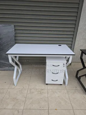 White Metallic Frame Desk and a Pedestal