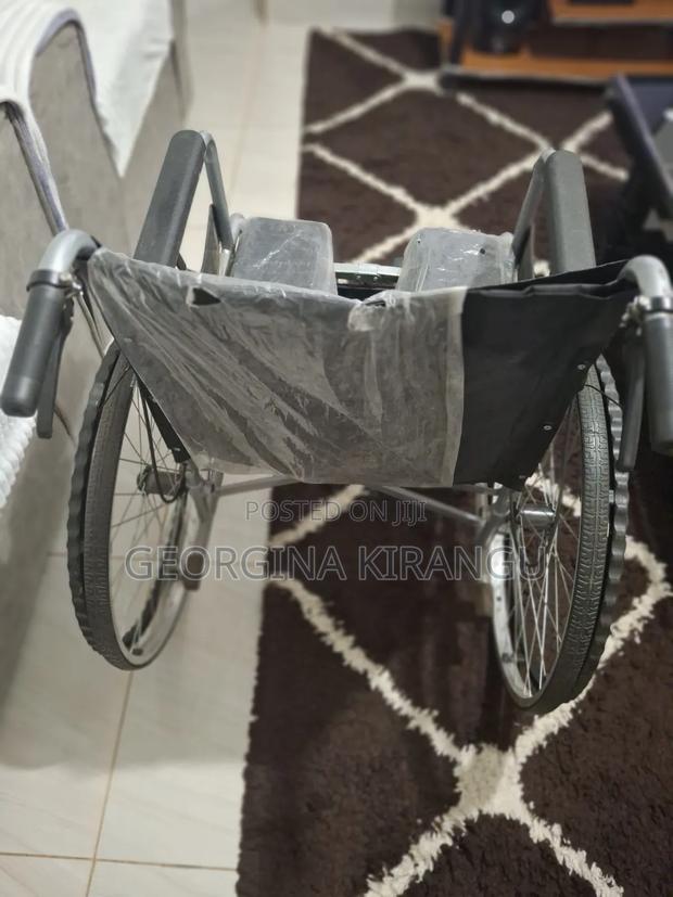 Wheelchair With a Commode - thumbnail 2