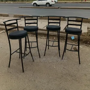 High Round Bar or Counter Stools With Black Metal Frame..