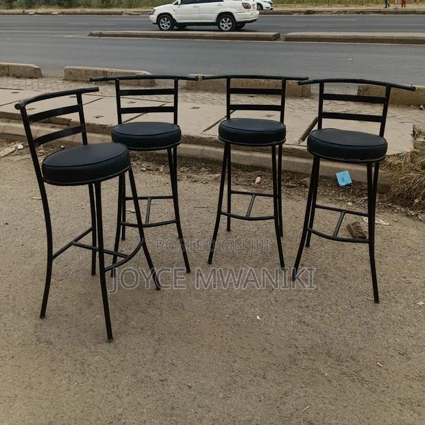 High Round Bar or Counter Stools With Black Metal Frame..
