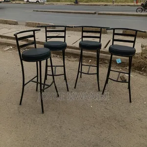 High Round Bar or Counter Stools With Black Metal Frame..