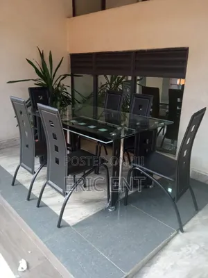 Executive 6 Sitter Glass Dinning Table  With Leather Seat