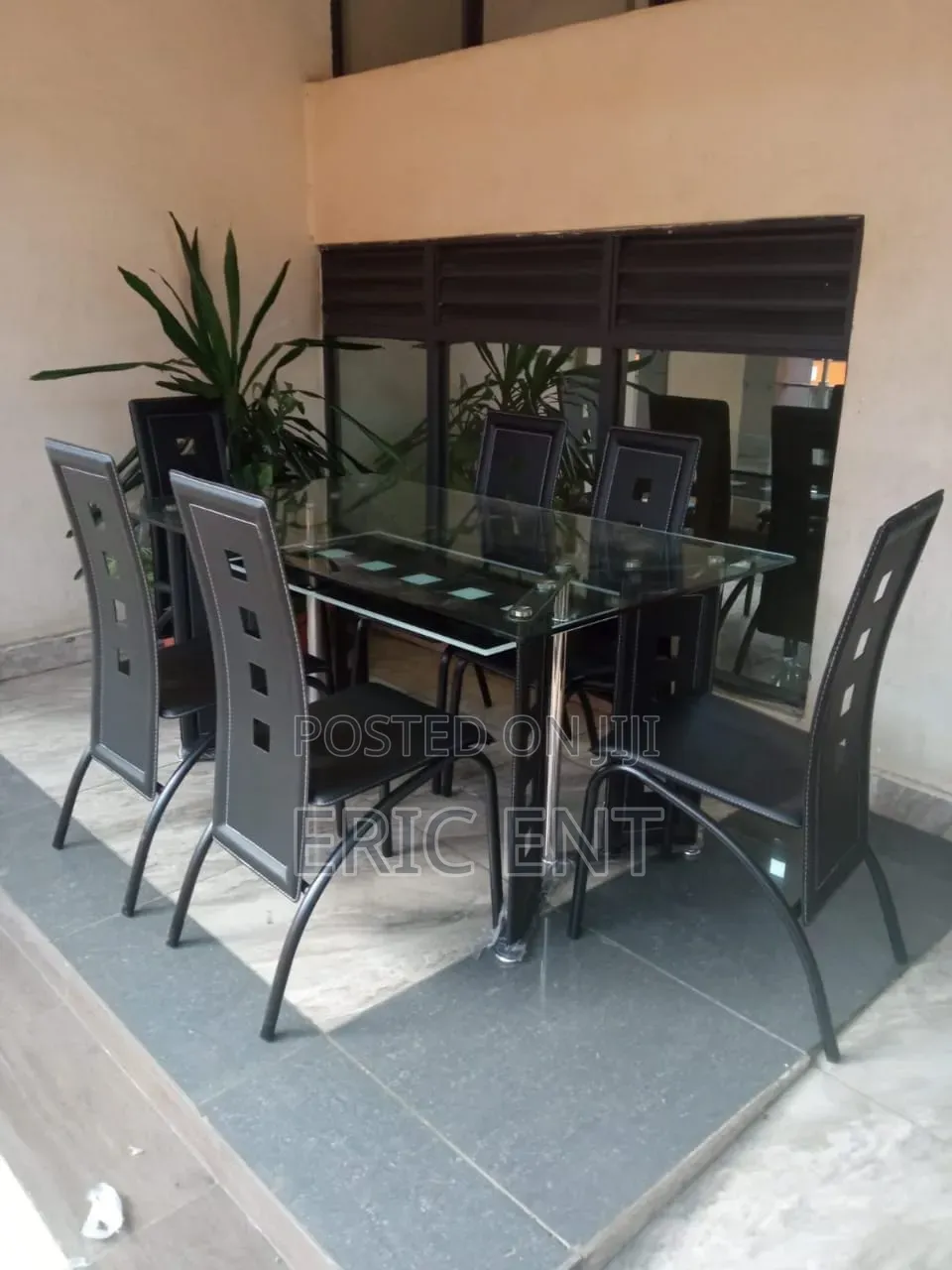 Executive 6 Sitter Glass Dinning Table  With Leather Seat