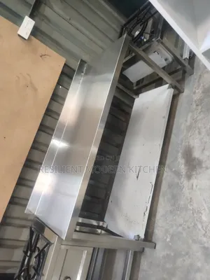 Stainless Steel Table With Undeshelf