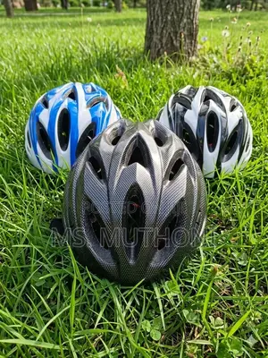 Lightweight, Aerodynamically Ventilated Adult Helmets