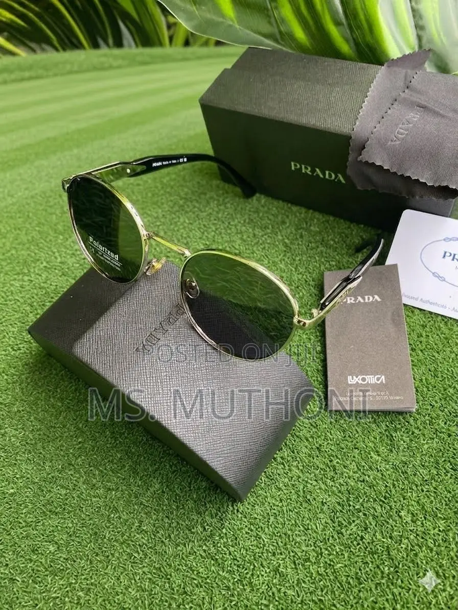 Prada PR 56ZS Full-Rim Round Polarized Sunglasses.