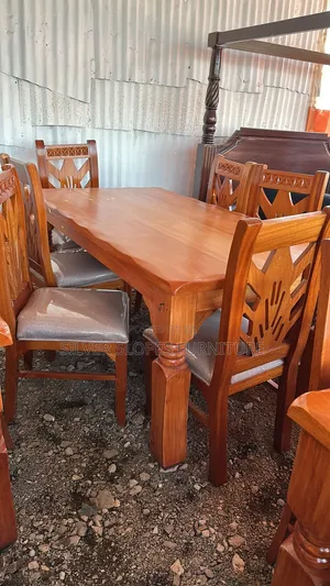 5- Hardwood (Mahogany) Dinning Table.
