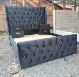 Black Diamond Tufted 5 by 6 Bed.