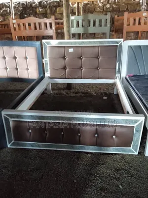 White and Brown 5 by 6 Bed