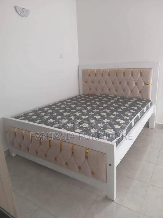 5 by 6 White and Beige Bed