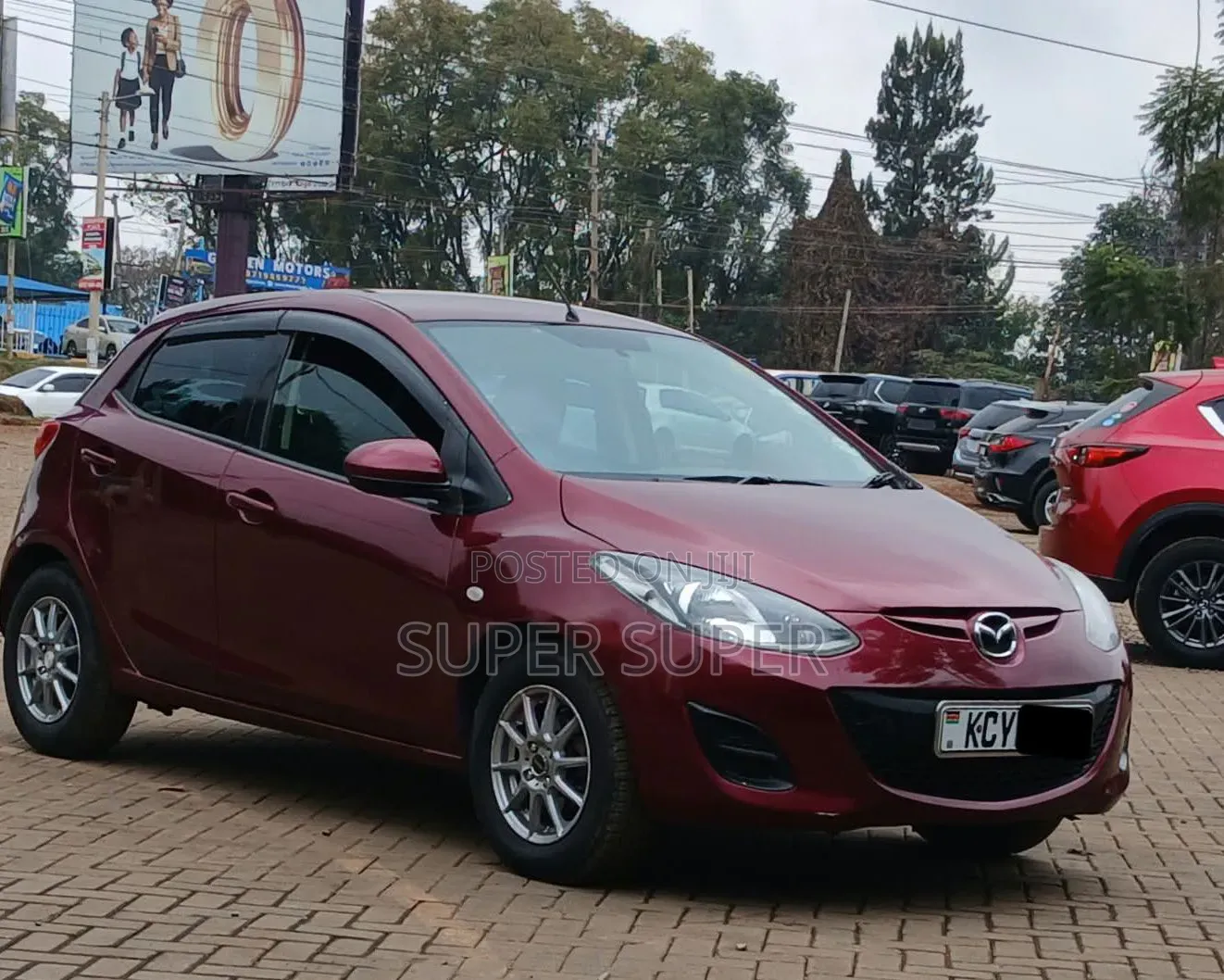 Mazda Demio 2013 Maroon