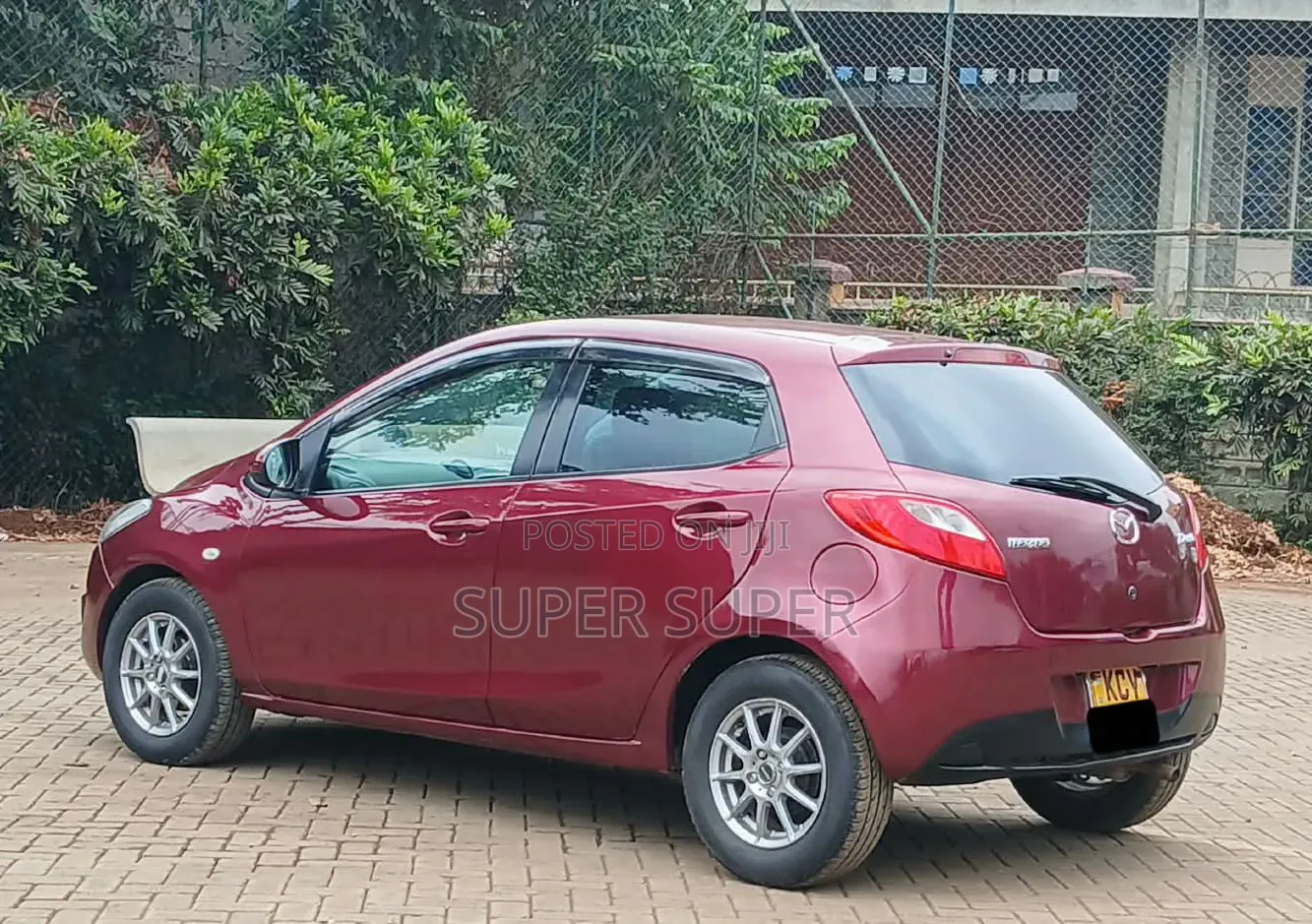 Mazda Demio 2013 Maroon