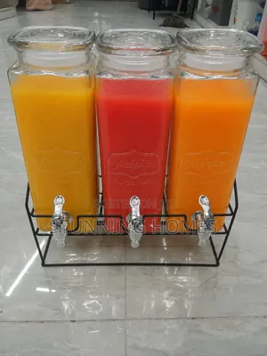 Triple Glass Juice Dispenser With a Metallic Stand