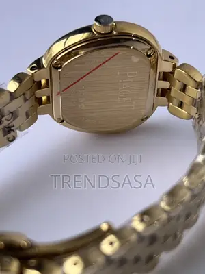 Piaget Cushion Shape Yellow Gold White Dial Ladies Watch