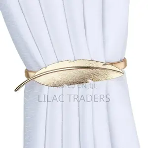 A Pair of Feather Shaped Elastic, Metallic Curtain Buckles @Gale