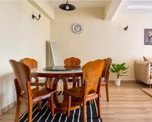 Elegant 6-Seater Round Wooden Dining Set With Glass Lazy Susan