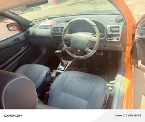 Toyota Starlet 1999 Orange