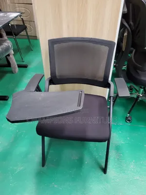 The Edutask Foldable Training Chair With Writing Pad