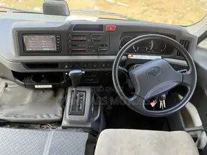 Toyota Coaster 2019 Beige