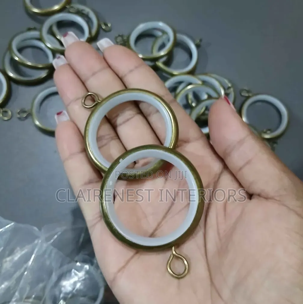 Antic and Bronze Round Curtain Rings With Inner Plastic Lining