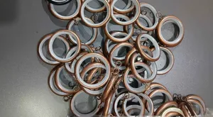 Antic and Bronze Round Curtain Rings With Inner Plastic Lining