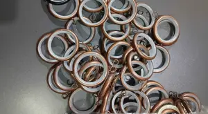 Antic and Bronze Round Curtain Rings With Inner Plastic Lining