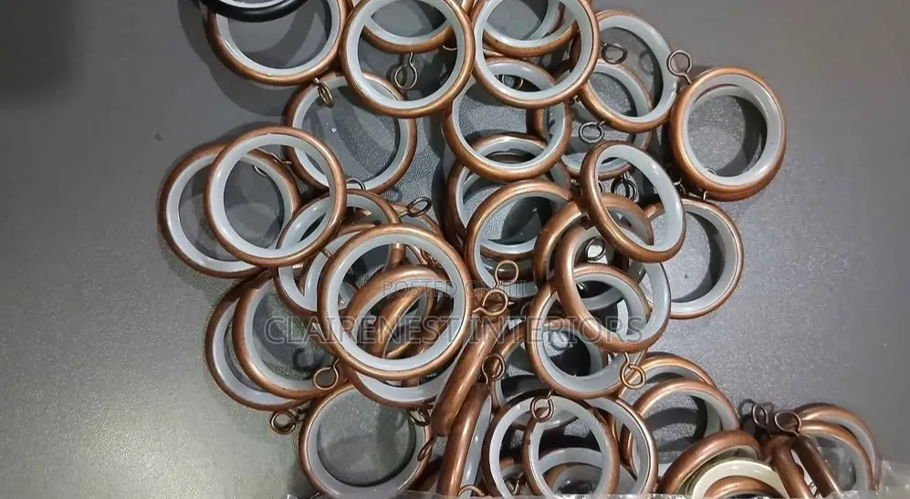 Antic and Bronze Round Curtain Rings With Inner Plastic Lining