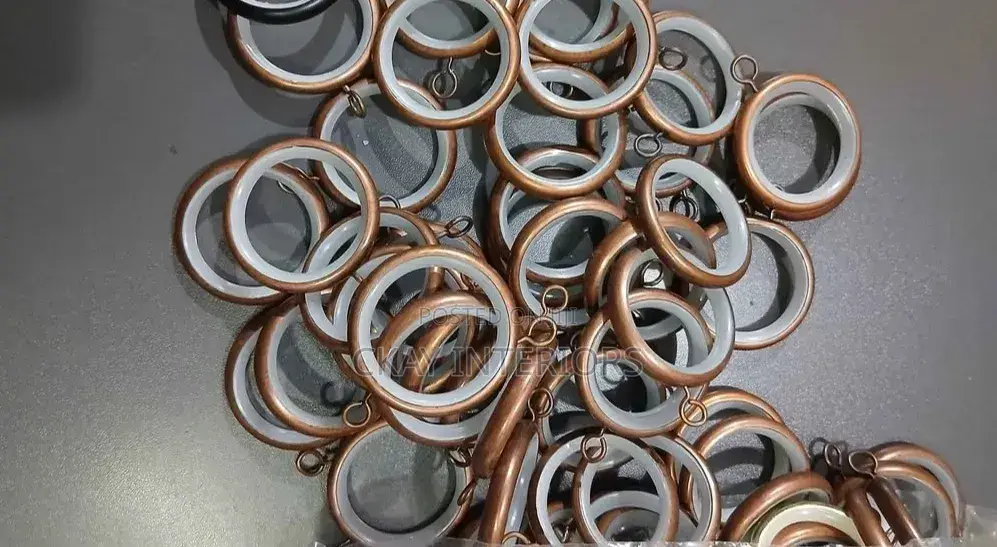 Antic and Bronze Round Curtain Rings With Inner Plastic Lining