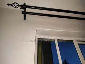 Black and Bronze Quality Support for Graceful Drapes.