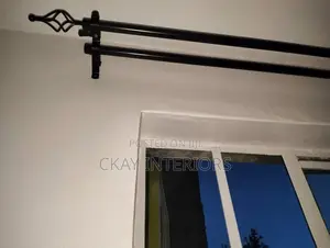 Black and Bronze Quality Support for Graceful Drapes.
