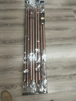 Black and Bronze Quality Support for Graceful Drapes.